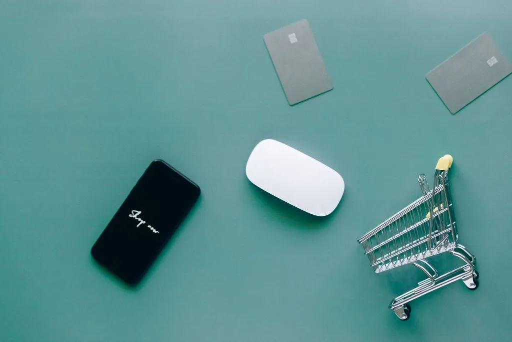 a man sitting in front of a laptop computer